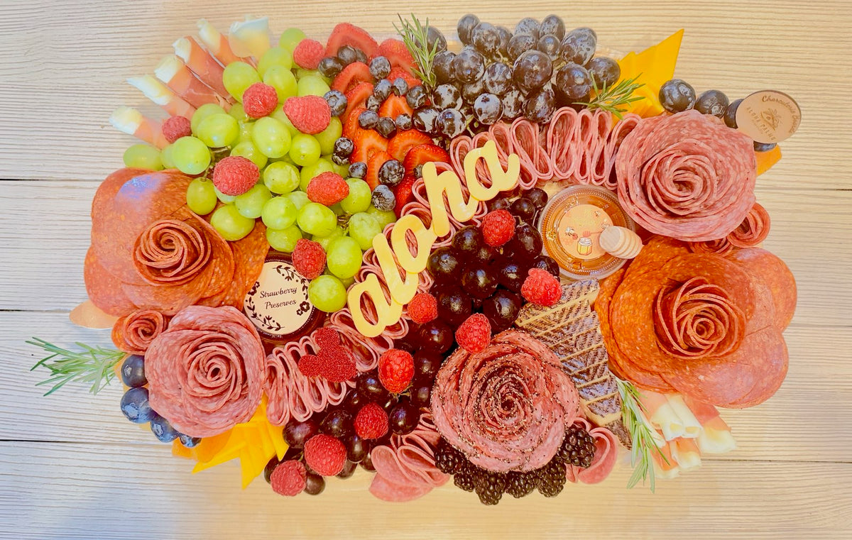 Aloha charcuterie board with salami roses, fresh fruit and cheese by Aloha Palms Hospitality, Ko Olina, Oahu